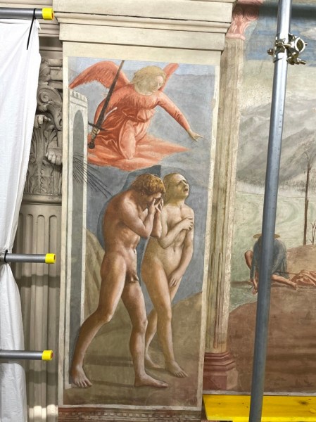 Masaccio's painting "Expulsion from the Garden of Eden." Adam and Eve walk naked through a doorway while an angel with a sword flies above.