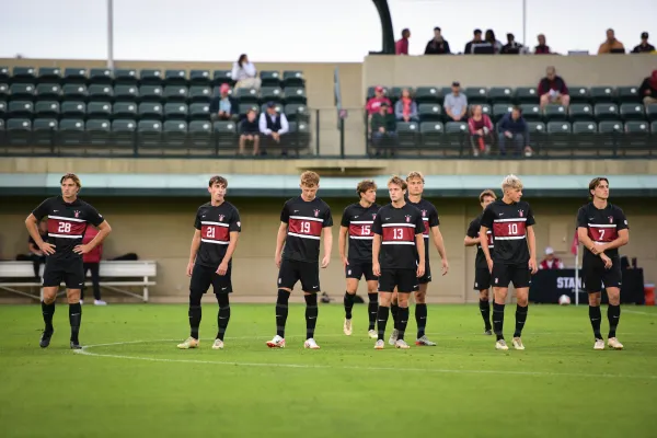 The Stanford men's soccer team walks onto the pitch in a game against Santa Clara. (Photo: CAYDEN GU/The Stanford Daily)