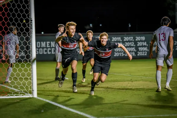 Layton Purchase and Shane de Flores celebrate next to the goal