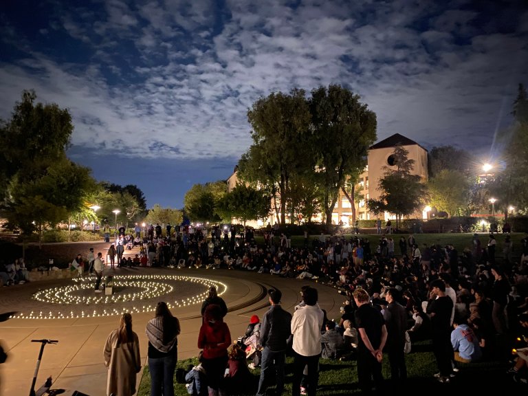 Hundreds of people in Meyer Green gathered around candles in the center in the evening