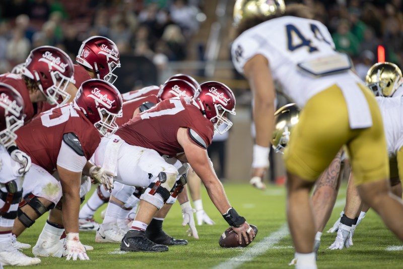 Stanford's offensive line sits at the line of scrimmage against Notre Dame.