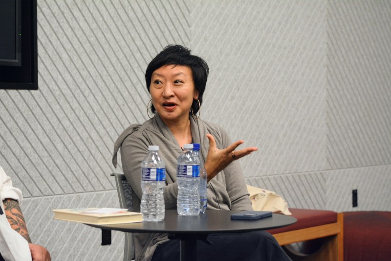 Cathy Park Hong addresses the moderator during her talk.