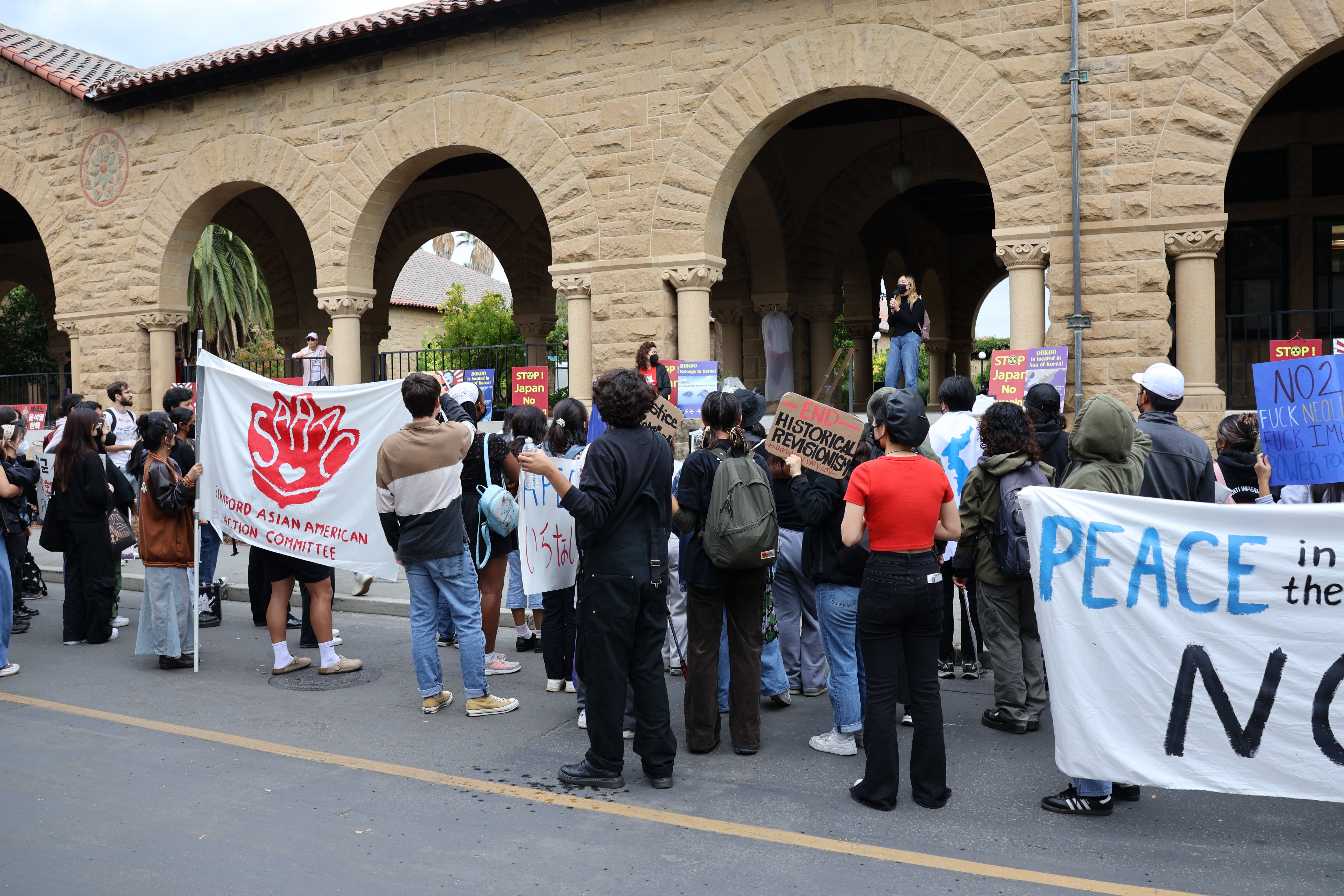 Protests mark South Korean president and Japanese prime minister’s Stanford go to