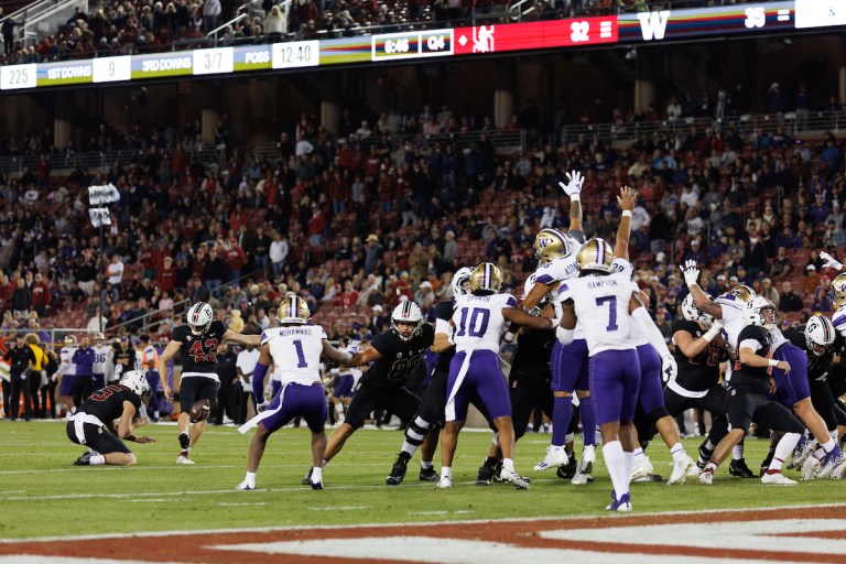 Senior kicker Joshua Karty attempts a field goal against Washington. Karty kicked the game-winning field goal against Washington State this week (Photo: Bob Drebin/ISI Photos)