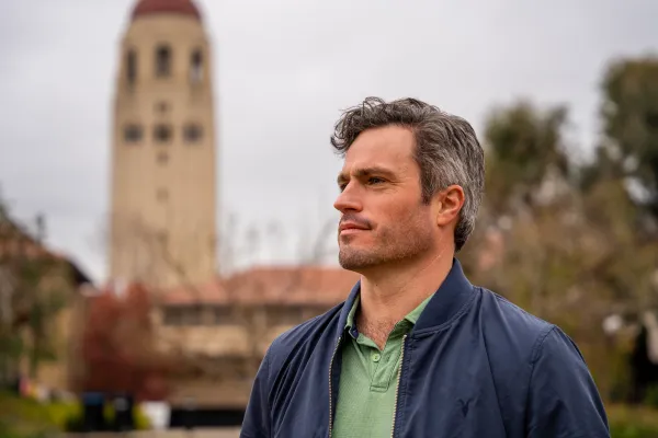 A picture of Peter Dixon in front of Hoover Tower. Dixon, an entrepreneur and former Marine, is running as a Democrat in the crowded open primary to replace Rep. Anna Eshoo, who has represented the district which includes Stanford for the past 16 terms.
