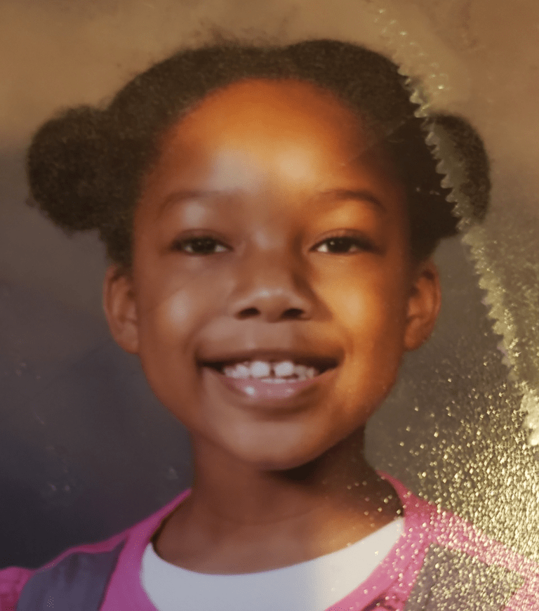 A headshot of the author as a child, presumably from a yearbook.