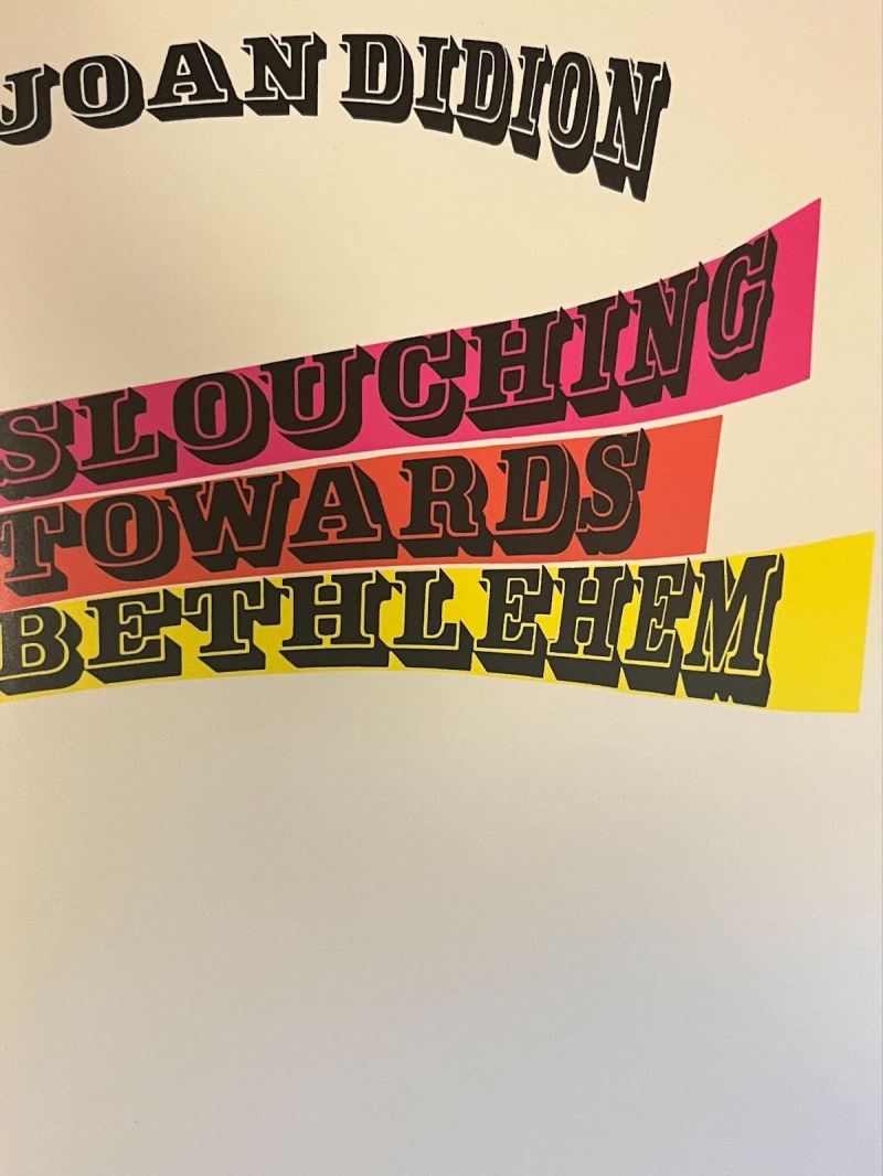 A book cover with "Joan Didion" on the top and the book title "Slouching Towards Bethlehem" underneath it, written in block letters.