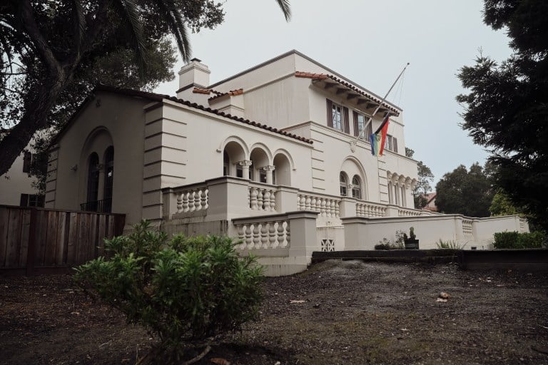 576 Alvarado, a two-story white house.