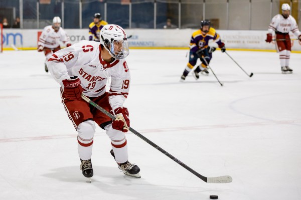 Freshman Taden Horse advances the hockey puck on transition play against Cal Lutheran. (Courtesy of Keith Tharp)