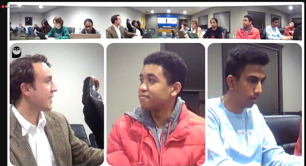 Zoom screenshot of Undergraduate Senate meeting in a room.