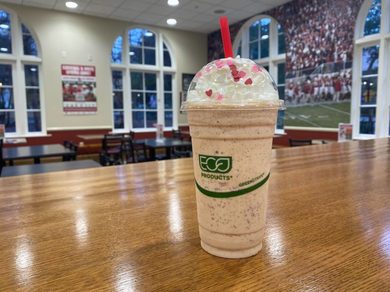 An image of a red velvet milkshake on a countertop from The Axe and Palm (TAP).