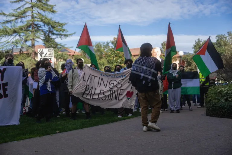 Students attend a protest at Encina Hall.