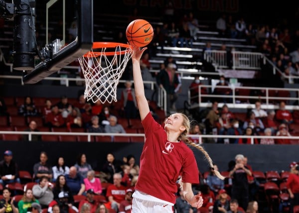 Cameron Brink attempts a layup in warmups before a game against Oregon.