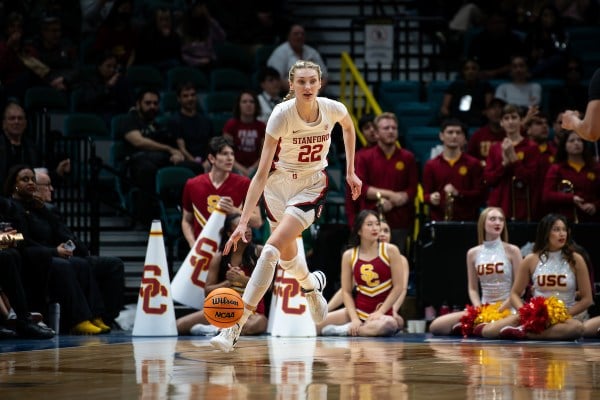Cameron Brink dribbles up the court in a game against USC.