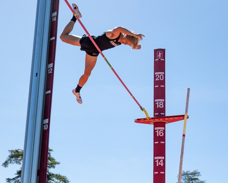 Junior Garrett Brown pole vaulting at the Stanford Invitational