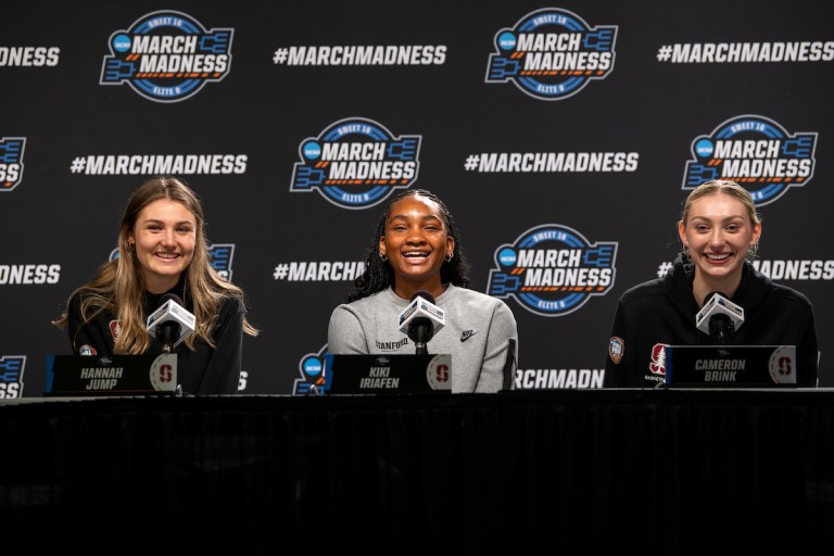 Hannah Jump, Kiki Iriafen and Cameron Brink at a press conference.