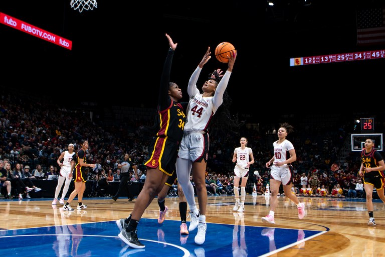 Kiki Iriafen attempts a field goal against USC.