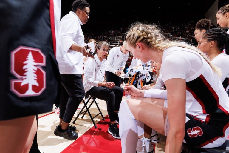 Tara VanDerveer huddles the team