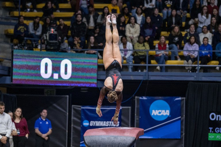 Chloe Widner performs at gymnastics meet.