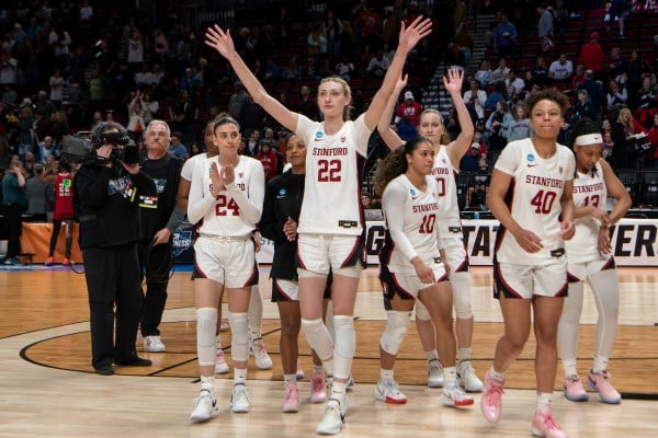 Stanford women's basketball team waves at crowd