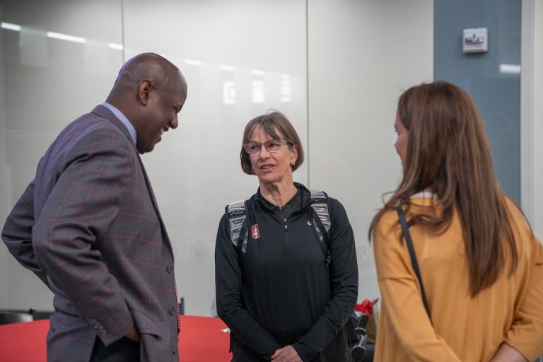 Bernard Muir and Tara VanDerveer talk at Kate Paye's press conference.