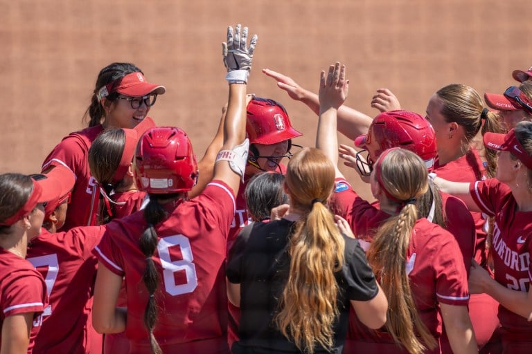 Stanford Softball celebrates a home run.