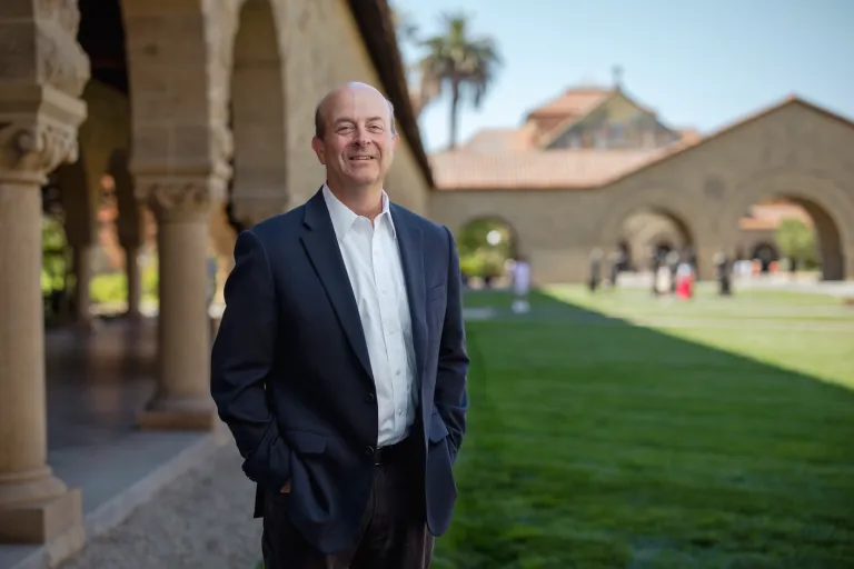 jay hamilton poses for a picture in main quad