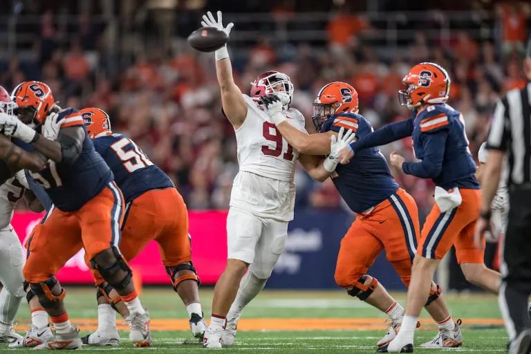 Clay Patterson bats down pass against Syracuse.