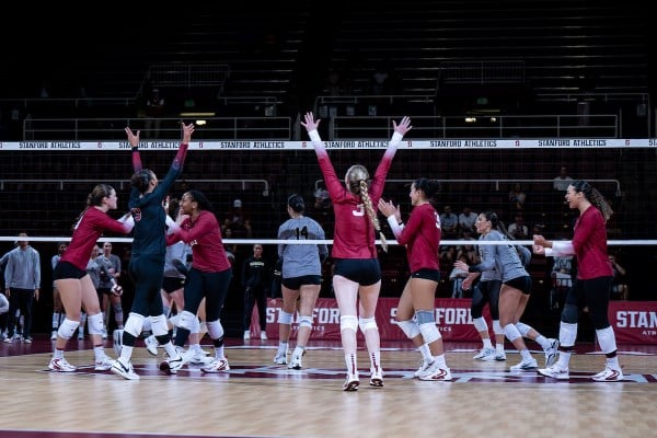 Stanford women's volleyball celebrates against Wake Forest.