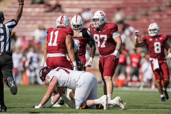 Stanford defense celebrates after a play against Virgina Tech.