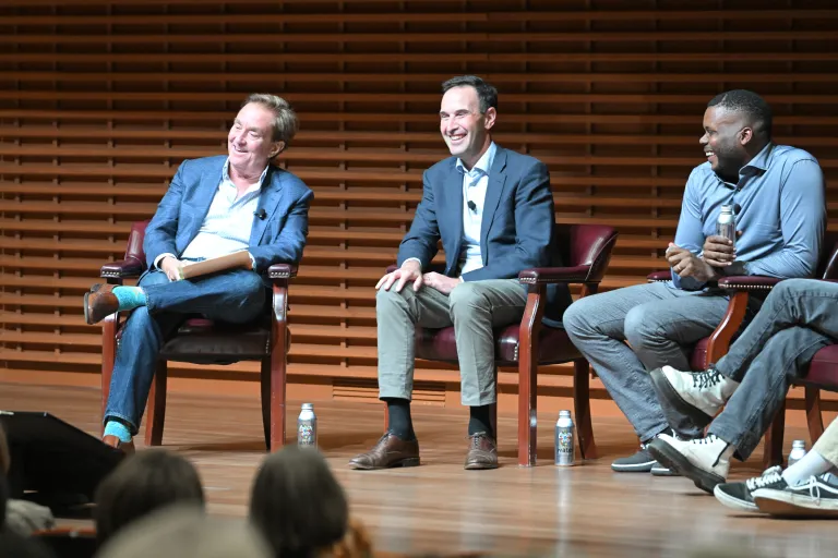 President Jonathan Levin, professor Jim Steyer and former Stockton mayor Michael Tubbs speak onstage at CEMEX Auditorium.