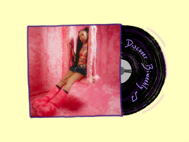 Album cover with a photo of artist Anycia and a record sliding out reading "Discover Biweekly" against a soft yellow background.