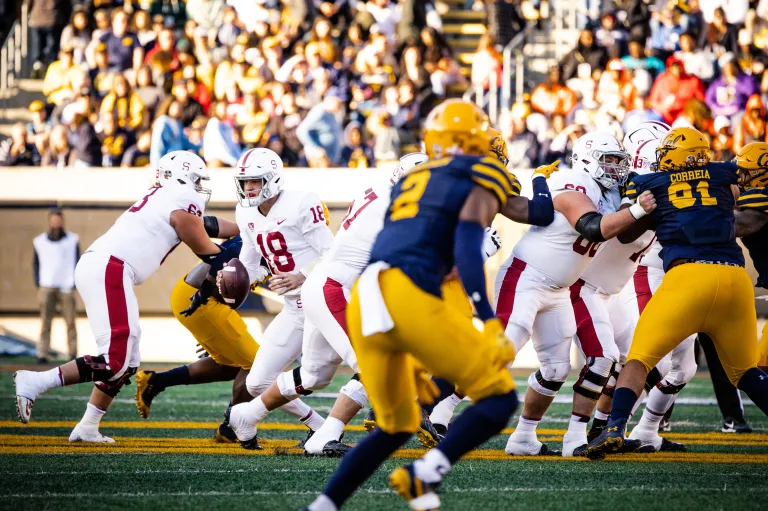 Cal and Stanford football players run into each other