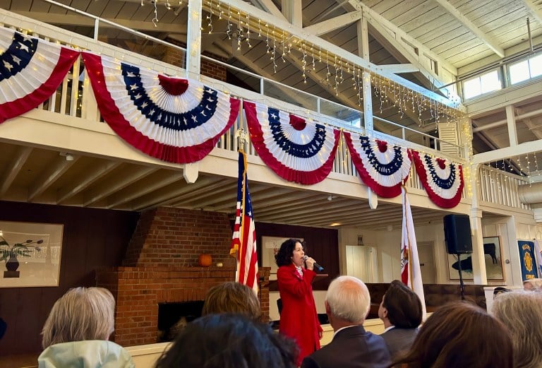 Stanford music lecturer Nova Jimenez performs as 60 community members pay tribute to fallen soldiers on Veteran's Day. (Photo: KAYLA CHAN/The Stanford Daily)