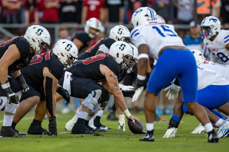 Jake Maikkula and the offensive linemen line up against Southern Methodist University.