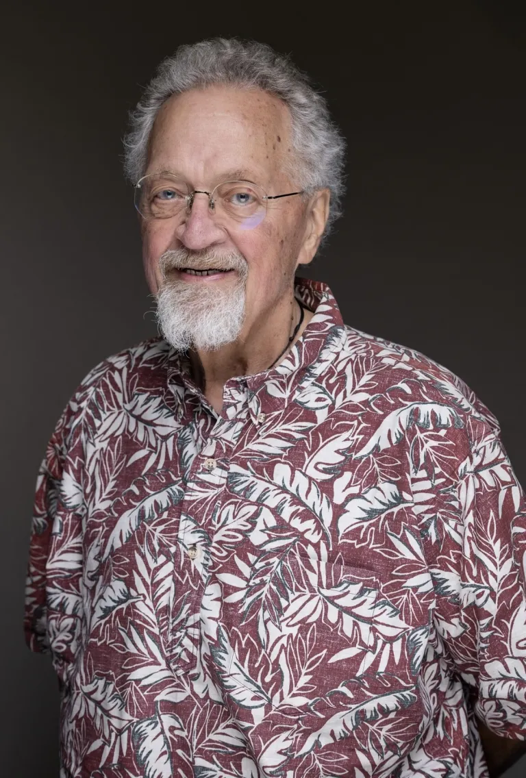 Professor Larry Crowder wearing glasses and a Hawaiian shirt.