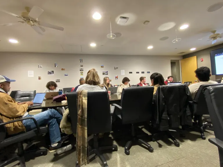 UGS Senators sitting around a table (Photo: ALANA BELLE M. TIRADO/The Stanford Daily)