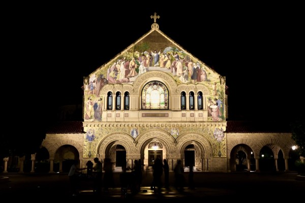 Memorial Church lit up in the dark.