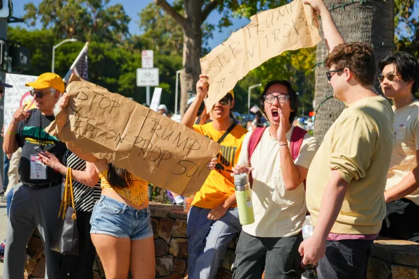 Student organizations and community members gathered in Palo Alto for "No Kings Day" protests. (Photo: TOBY SHIAO/The Stanford Daily)