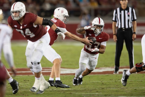 Cole Tabb takes a handoff during the homecoming game against Florida State at Stanford Stadium on Oct. 18. Tabb collected a career-high 118 yards in Stanford's 20-13 win over Florida State. (Photo: MICHAEL YU/The Stanford Daily)