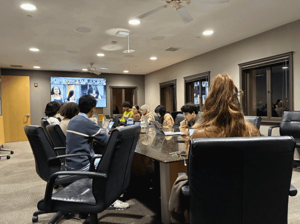 UGS senators gathered around a table for their weekly meeting.