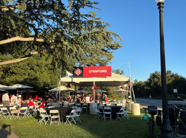 A tailgate for the Class of 1990 served barbecue and drinks before the homecoming football game. (Photo: MARA HANKINS/The Stanford Daily)