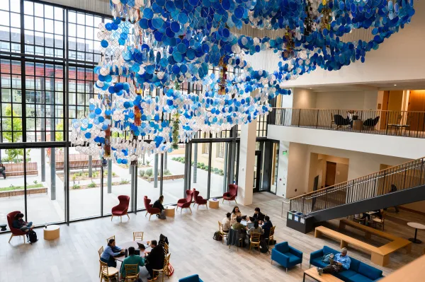 A blue and white art installation hangs on the roof of the GSE.