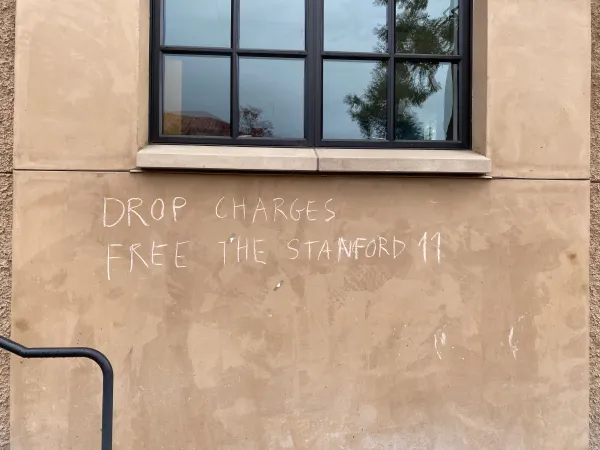 An image of chalk graffiti on The Stanford Daily building. (Photo: JENNIFER LEVINE/The Stanford Daily)