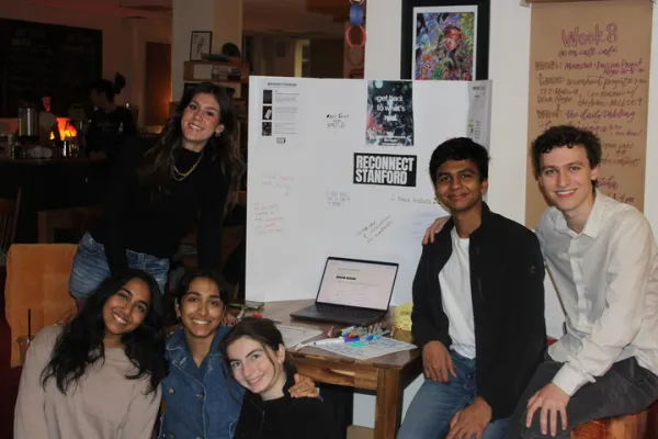 Members of Reconnect Stanford pose at On Call Cafe for a social media deletion event