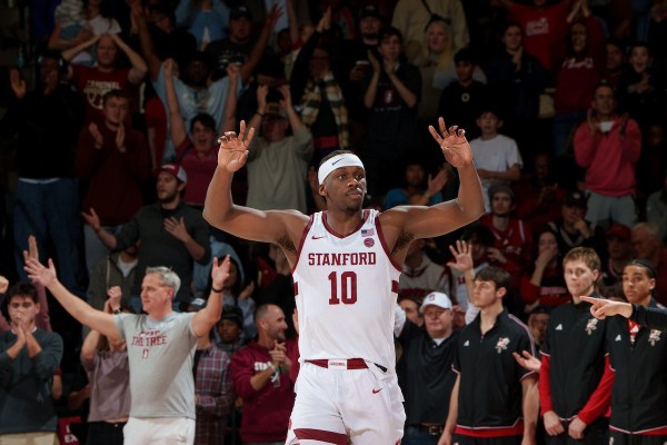 Chisom Okpara celebrates a shot during a game against the University of Louisville at Maples Pavilion on Jan. 2. Okpara will miss the rest of this season due to an injury. (Photo: JOHN TODD/ISI Photos)