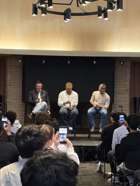 Jake Paul and Geoffrey Woo ’11 M.S. ’11 in an event hosted by BASES. (Photo: NAOMI BREUER/The Stanford Daily)