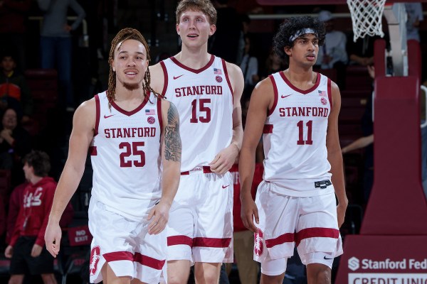 Jeremy Dent-Smith, Oskar Giltay and Ryan Agarwal during a game against the University of Louisville at Maples Pavilion on Jan. 2. Stanford secured its second win of the season against a ranked opponent Wednesday night. (Photo: JOHN TODD/ISI Photos)