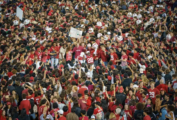 The Stanford football team celebrates with fans after last November's Big Game at Stanford Stadium on Nov. 22, 2025. Seniors witnessed their first Big Game win and are excited for the spring season of sports. (Photo: JOHN TODD/ISI Photos)