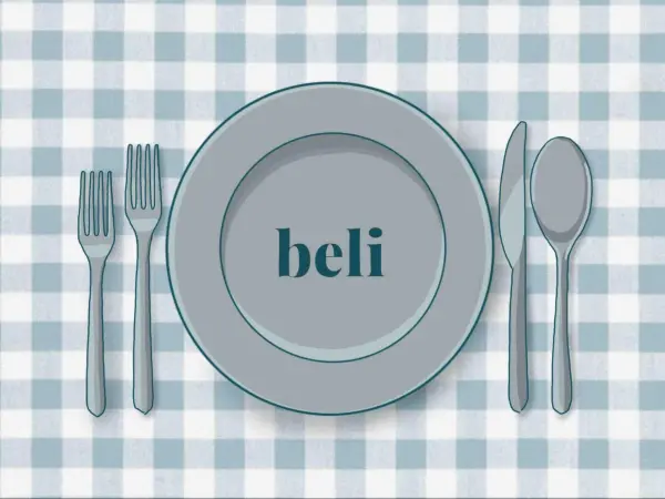 A plate is flanked by two forks, a spoon and a knife on a plaid table cloth and the beli logo at the center.